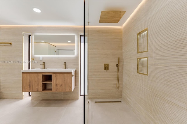 15201 SW 87th Ct, Palmetto Bay, FL 33157 - full bath featuring tile patterned flooring, double vanity, tile walls, and a tile shower
