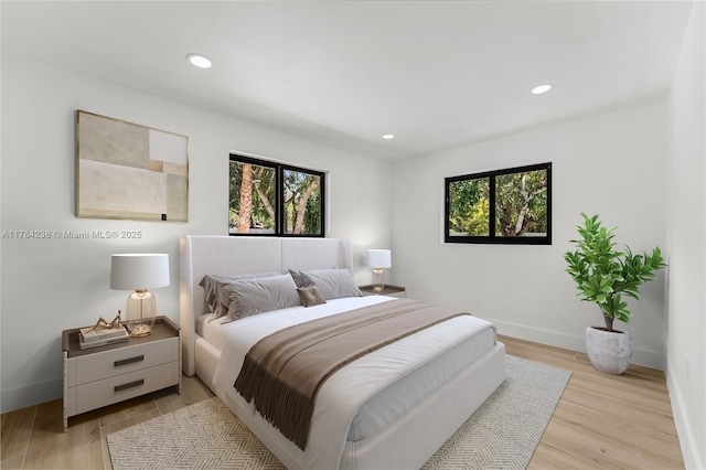15201 SW 87th Ct, Palmetto Bay, FL 33157 - bedroom featuring light wood-style flooring, baseboards, and recessed lighting