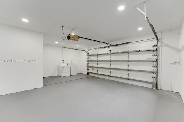15201 SW 87th Ct, Palmetto Bay, FL 33157 - garage featuring recessed lighting, washer and dryer, and a garage door opener