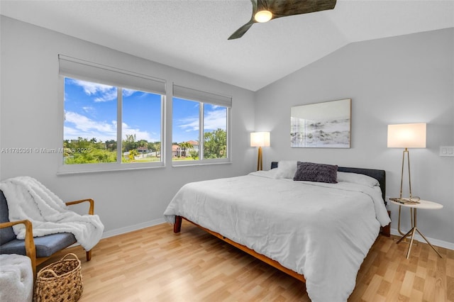 13473 NW 5th Ct, Plantation, FL 33325 - bedroom with baseboards, wood finished floors, vaulted ceiling, and a ceiling fan