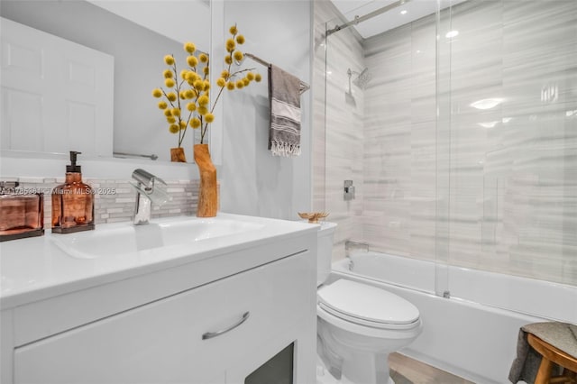 13473 NW 5th Ct, Plantation, FL 33325 - full bath with shower / bath combination with glass door, vanity, backsplash, and toilet