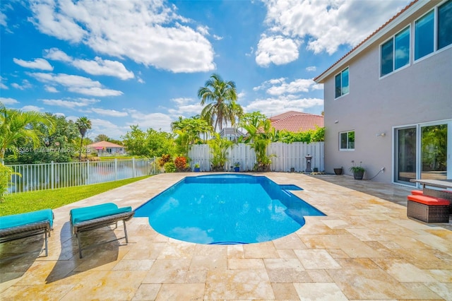 13473 NW 5th Ct, Plantation, FL 33325 - view of swimming pool with a patio, a fenced backyard, a fenced in pool, and a water view