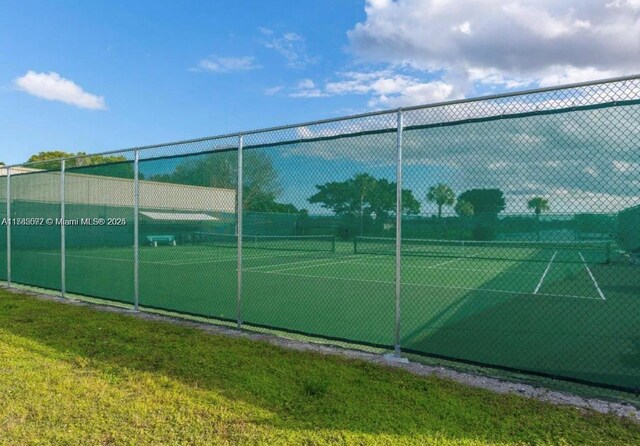 60 Burgundy B 60, Delray Beach, FL 33484 - view of sport court featuring fence