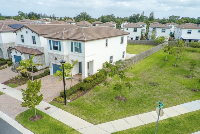 birds eye view of property with a residential view