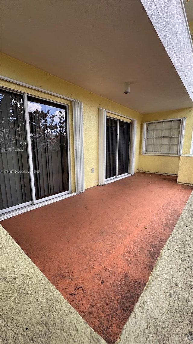 10795 SW 108th Ave Unit 103, Miami, FL 33176 - exterior space with a patio area and stucco siding