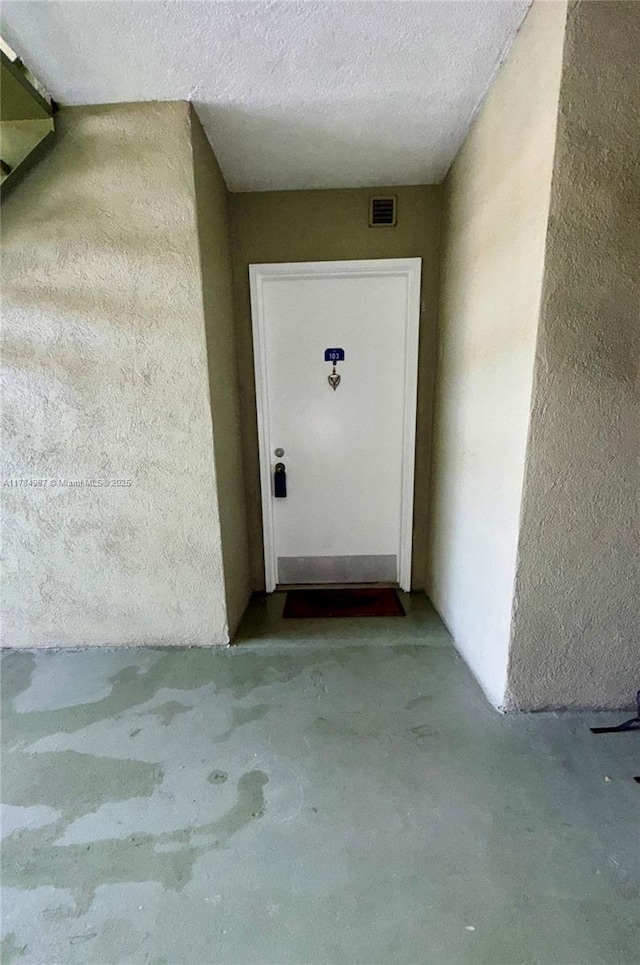 10795 SW 108th Ave Unit 103, Miami, FL 33176 - doorway to property with visible vents