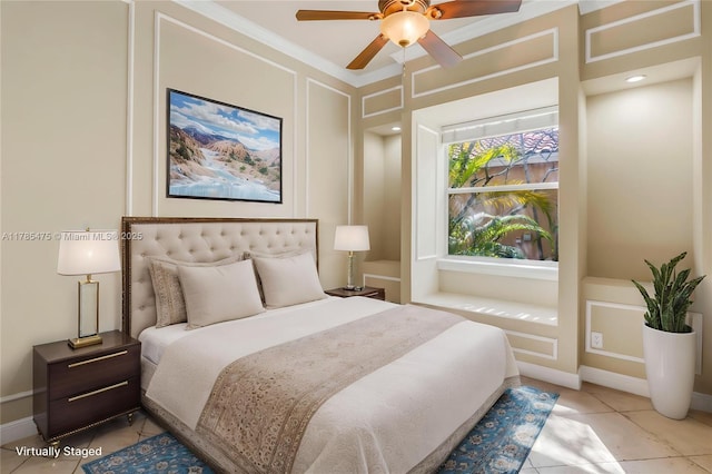bedroom with a decorative wall, light tile patterned floors, and crown molding