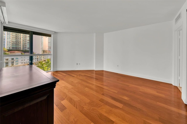 16500 Collins Ave Unit 656, Sunny Isles Beach, FL 33160 - unfurnished room featuring light wood-style flooring and baseboards