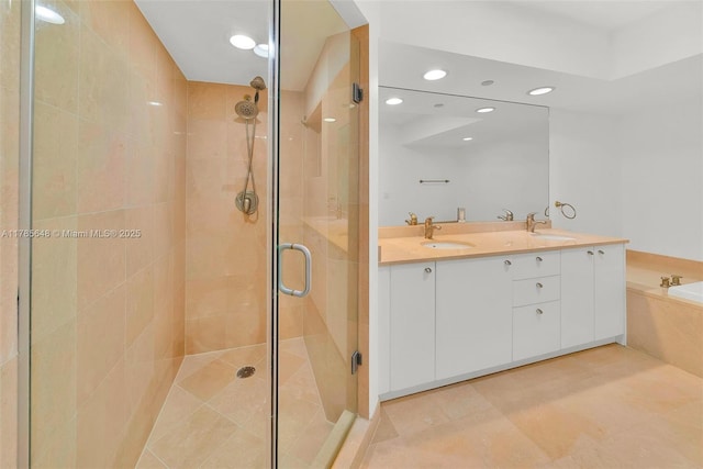 16500 Collins Ave Unit 656, Sunny Isles Beach, FL 33160 - full bath with a shower stall, double vanity, a bath, recessed lighting, and tile patterned floors