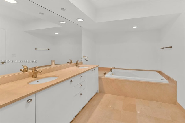 16500 Collins Ave Unit 656, Sunny Isles Beach, FL 33160 - bathroom featuring a garden tub, double vanity, and recessed lighting