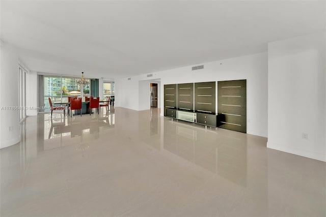 16500 Collins Ave Unit 656, Sunny Isles Beach, FL 33160 - tiled empty room featuring a chandelier