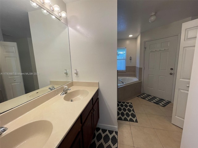 1214 SW Patricia Ave, Port St Lucie, FL 34953 - bathroom with a bath, a sink, and tile patterned flooring