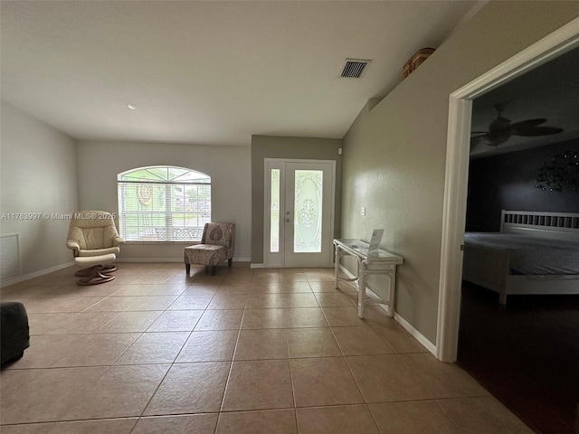1214 SW Patricia Ave, Port St Lucie, FL 34953 - foyer entrance with tile patterned flooring and baseboards