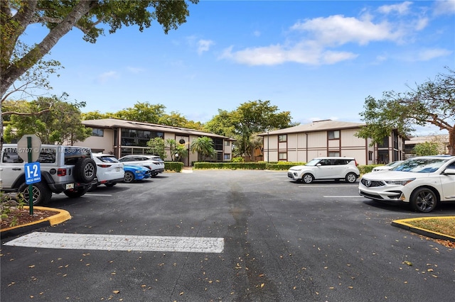 9660 S Belfort Cir Unit 207, Tamarac, FL 33321 - view of uncovered parking lot