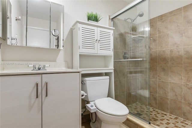 9660 S Belfort Cir Unit 207, Tamarac, FL 33321 - bathroom featuring toilet, vanity, and a stall shower