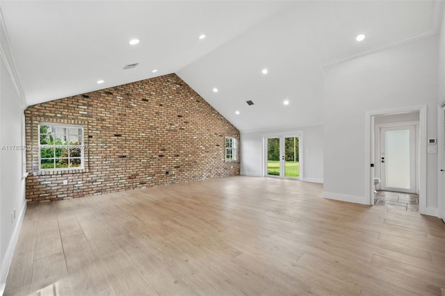 6320 Hancock Rd, Southwest Ranches, FL 33330 - unfurnished living room with brick wall, light wood-type flooring, high vaulted ceiling, and recessed lighting