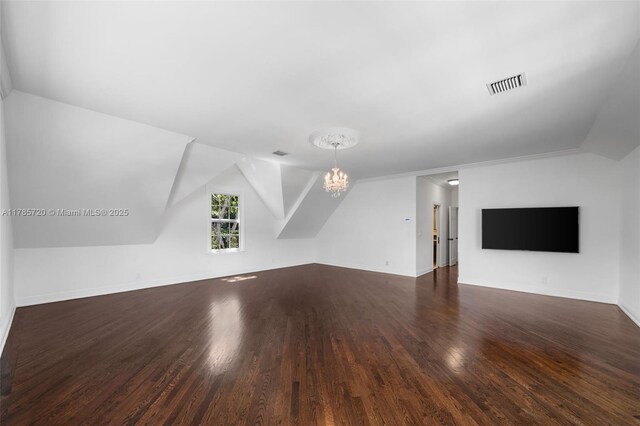 6320 Hancock Rd, Southwest Ranches, FL 33330 - additional living space with wood finished floors, a chandelier, baseboards, and vaulted ceiling