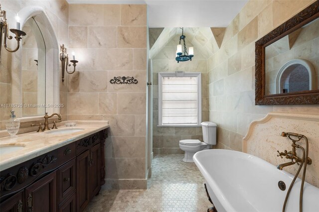 6320 Hancock Rd, Southwest Ranches, FL 33330 - bathroom featuring tile walls, a shower stall, vanity, and a soaking tub