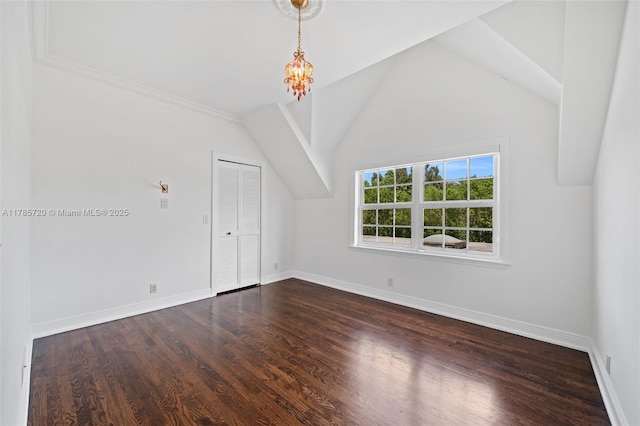 6320 Hancock Rd, Southwest Ranches, FL 33330 - bonus room featuring dark wood-style flooring, a chandelier, and vaulted ceiling