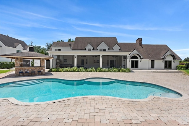 6320 Hancock Rd, Southwest Ranches, FL 33330 - outdoor pool with a patio area and a sunroom