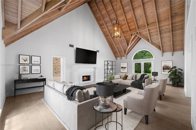 6320 Hancock Rd, Southwest Ranches, FL 33330 - bedroom with a chandelier, wood finished floors, baseboards, and vaulted ceiling