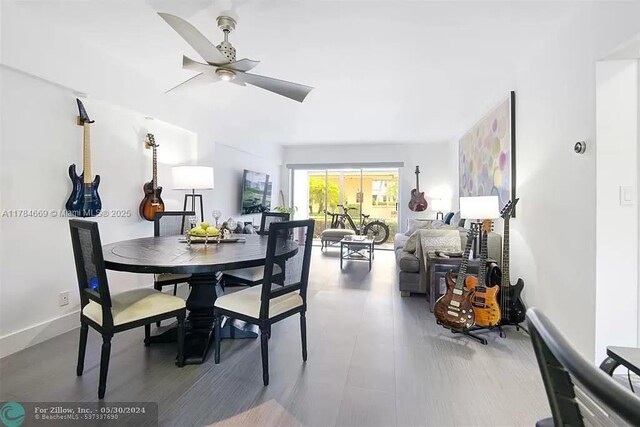 331 SW 8th St Unit 1-C-E, Boca Raton, FL 33432 - dining area featuring baseboards, ceiling fan, and wood finished floors