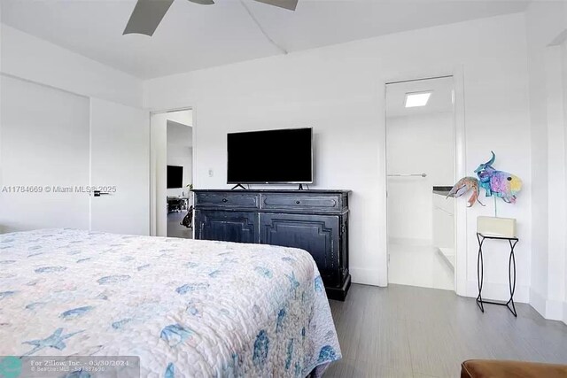 331 SW 8th St Unit 1-C-E, Boca Raton, FL 33432 - bedroom featuring ceiling fan and dark wood-style floors