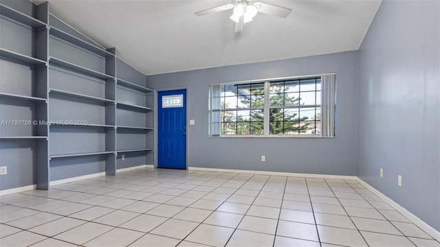 5010 SW 201st Ter, Southwest Ranches, FL 33332 - empty room featuring a ceiling fan, light tile patterned flooring, and a textured ceiling