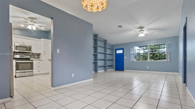 5010 SW 201st Ter, Southwest Ranches, FL 33332 - unfurnished room featuring a ceiling fan, light tile patterned floors, built in features, and lofted ceiling