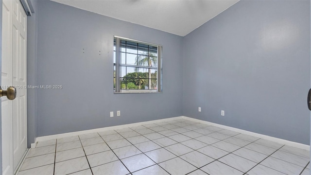 5010 SW 201st Ter, Southwest Ranches, FL 33332 - unfurnished room with vaulted ceiling and light tile patterned flooring