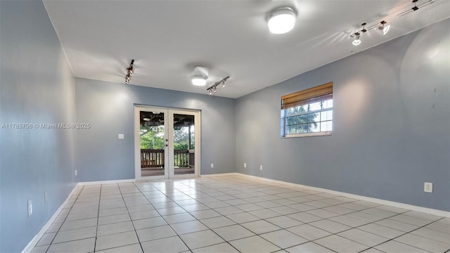 5010 SW 201st Ter, Southwest Ranches, FL 33332 - unfurnished room featuring rail lighting and light tile patterned flooring