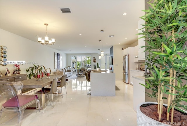 10550 NW 63rd Ter, Doral, FL 33178 - interior space with recessed lighting, visible vents, light tile patterned floors, and an inviting chandelier