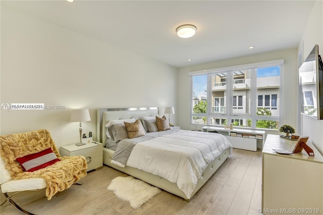 10550 NW 63rd Ter, Doral, FL 33178 - bedroom featuring light wood finished floors and recessed lighting