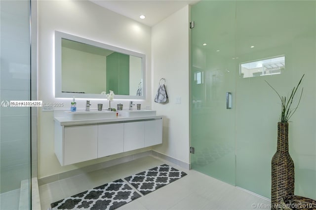 10550 NW 63rd Ter, Doral, FL 33178 - full bath featuring double vanity, a shower stall, tile patterned flooring, and a sink