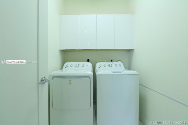 10550 NW 63rd Ter, Doral, FL 33178 - clothes washing area featuring cabinet space and washing machine and dryer