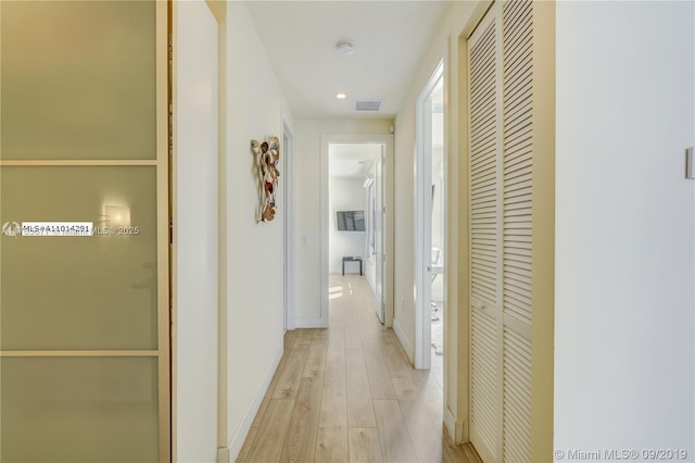 10550 NW 63rd Ter, Doral, FL 33178 - corridor with recessed lighting, visible vents, light wood finished floors, and baseboards