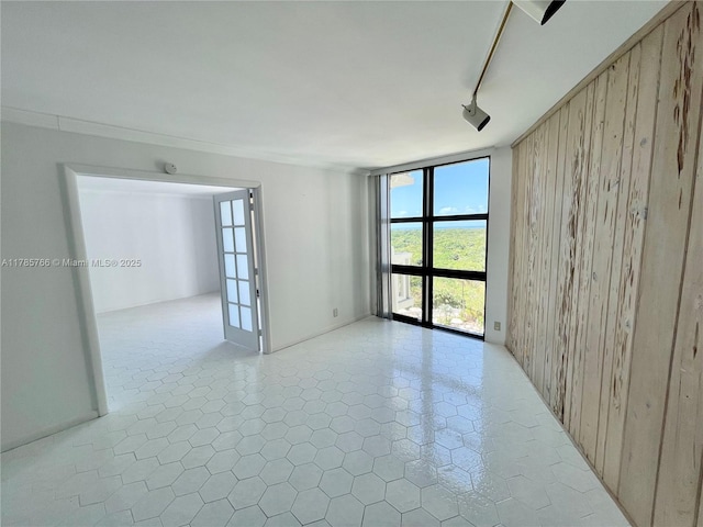 1111 Crandon Blvd Unit B804, Key Biscayne, FL 33149 - spare room with wooden walls and expansive windows