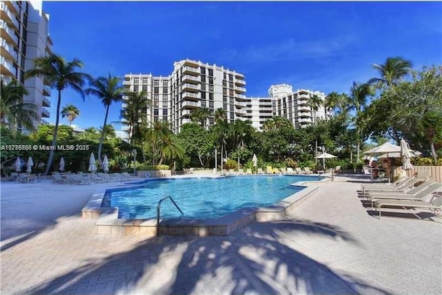 1111 Crandon Blvd Unit B804, Key Biscayne, FL 33149 - community pool featuring a patio