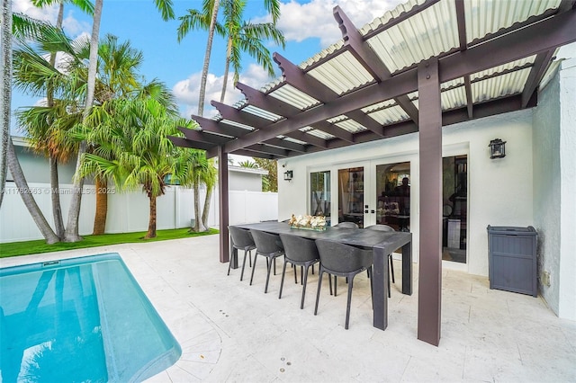 view of swimming pool featuring a pergola, a fenced in pool, a fenced backyard, and a patio