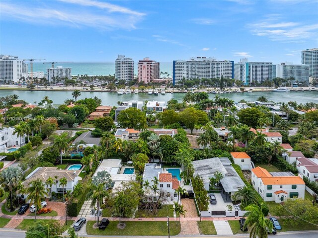 bird's eye view with a city view and a water view