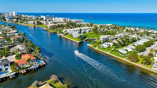 drone / aerial view with a water view