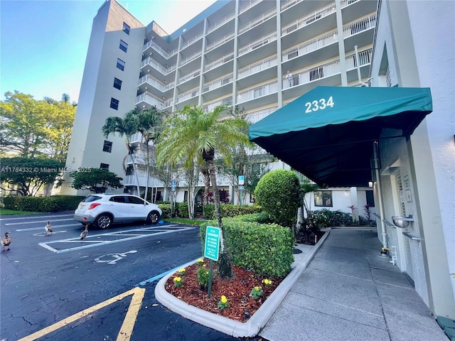 2334 S Cypress Bend Dr Unit 505, Pompano Beach, FL 33069 - view of property with uncovered parking