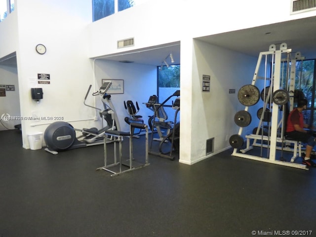 2334 S Cypress Bend Dr Unit 505, Pompano Beach, FL 33069 - workout area with a towering ceiling and visible vents