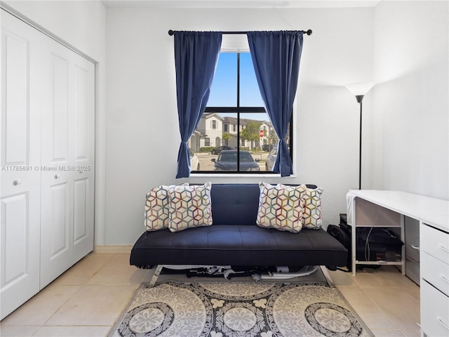 sitting room featuring light tile patterned floors