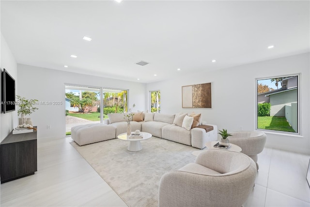 living area featuring recessed lighting