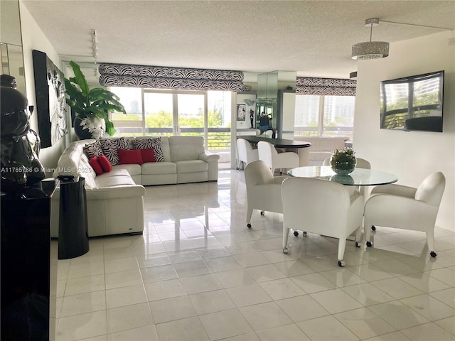 19101 NE 36th Ct Unit 807, Aventura, FL 33180 - dining area with a textured ceiling and light tile patterned floors