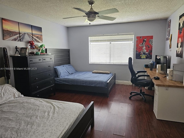 bedroom with wood finished floors, a textured ceiling, and ceiling fan