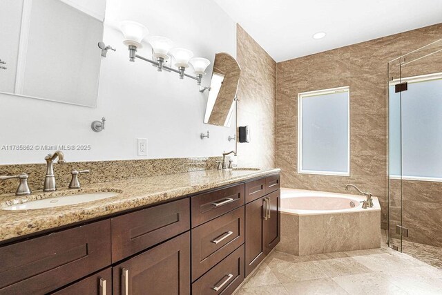 11201 SW 1st St, Plantation, FL 33325 - bathroom featuring a shower stall, a garden tub, a sink, and double vanity
