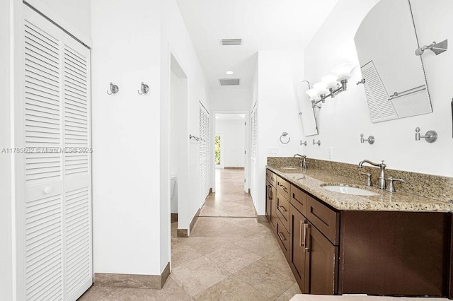 11201 SW 1st St, Plantation, FL 33325 - bathroom with visible vents, a closet, and a sink