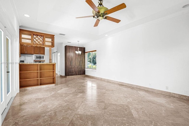 11201 SW 1st St, Plantation, FL 33325 - unfurnished living room with a raised ceiling, visible vents, crown molding, baseboards, and ceiling fan with notable chandelier